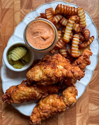Crispy Chicken Fingers with Cane’s Sauce